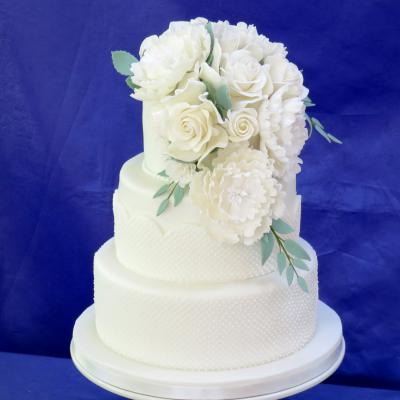 Cake Decorated with Rainbow Sugarcraft handcrafted Sugar Flowers